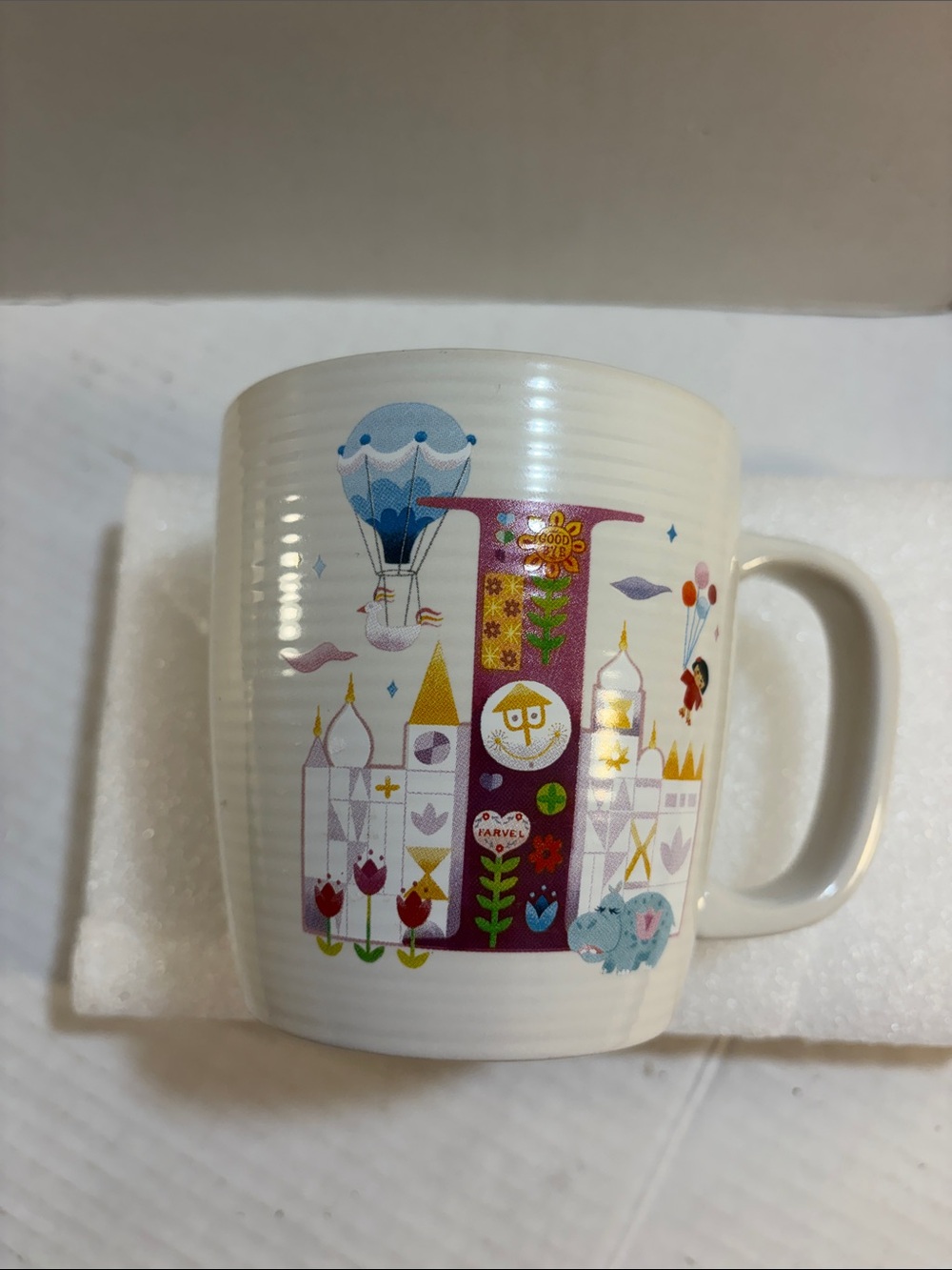 Disney Parks, ABC collection letter. It’s a Small World Coffee  Mug 16 ounces.